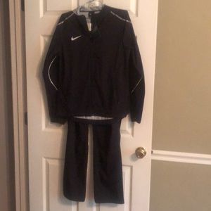 Women’s Nike size medium windbreaker style set.
